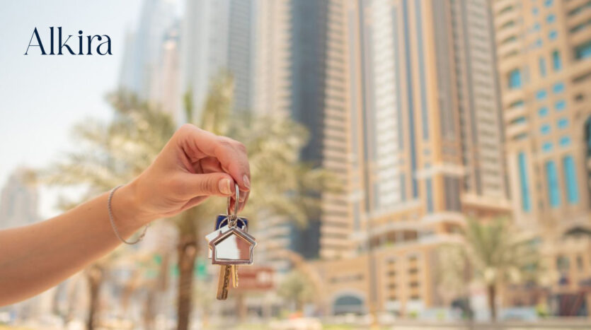 Homebuyer reviewing property documents to avoid mistakes when buying property in Dubai by Alkira